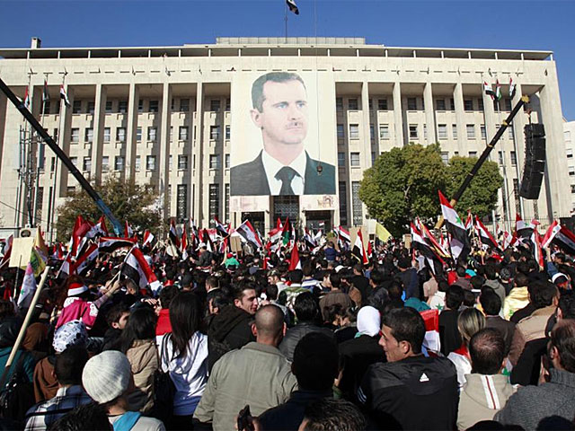 Sirios se manifiestan contra las sanciones econmicas impuestas por la Liga rabe. | Efe