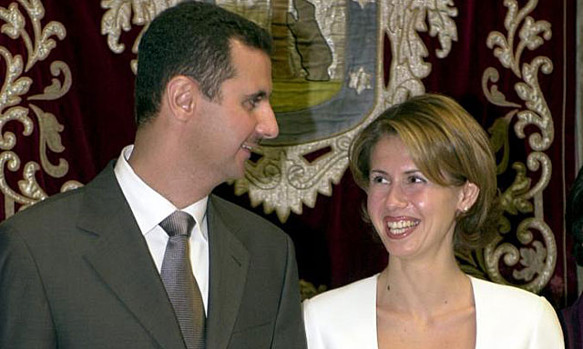 El presidente sirio y su esposa, Asma Asad, en un viaje a Madrid. | Efe