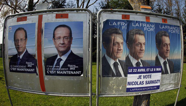 Psteres electorales de Franois Hollande y Nicolas Sarkozy cerca de Estrasburgo. | Reuters