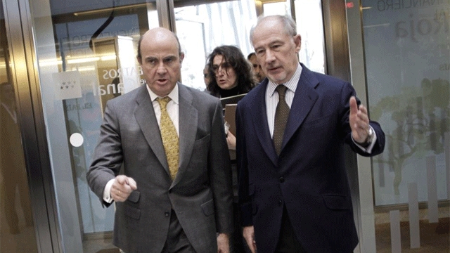 El ministro de Economa, Luis de Guindos, y el ex presidente de Bankia, Rodrigo Rato. | EM