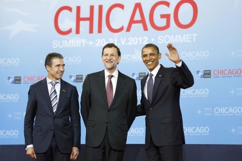 Rasmussen, Rajoy y Obama. | Reuters
