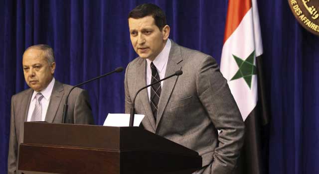 El portavoz de Exteriores, Yihad Maqdesi, comparece ante los medios en Damasco. | Efe
