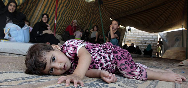 Una nia siria, en el campamento de Bashabsheh, en Ramtha.| Afp