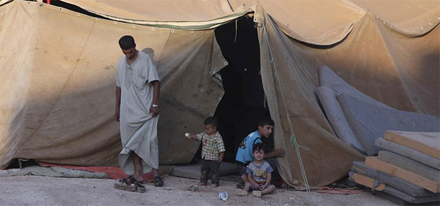 Refugiados sirios en el campamento de Bashabsha, cerca de la ciudad de Ramtha. | Reuters