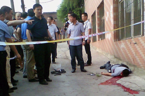 El cuerpo de Zhou Kehua, matado por la polica. | Afp