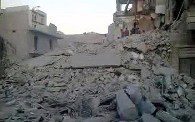 Una imagen del vdeo de YouTube que presuntamente muestra el edificio destruido en Alepo.
