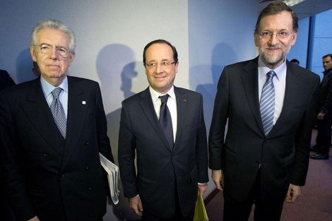 Monti. Hollande y Rajoy.| Afp