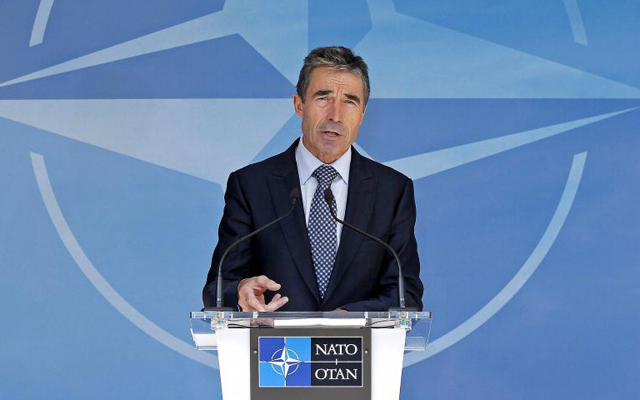 El secretario general de la OTAN, Rasmussen, en una rueda de prensa en Bruselas. | Reuters