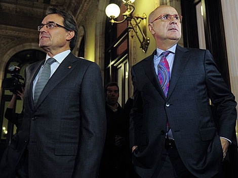 Artur Mas y Josep Antoni Duran Lleida, en la toma posesin del primero. | Afp