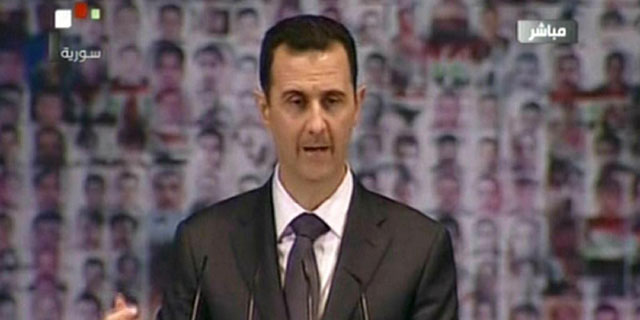 El presidente sirio Bashar Asad, durante su discurso televisado. | Afp