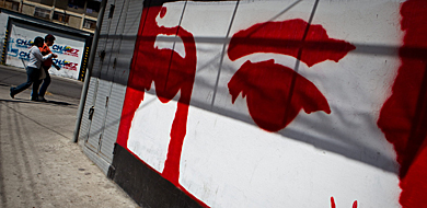 Un grafiti con el rostro de Chvez en una calle de Caracas. MS IMGENES