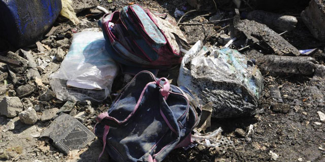 Mochilas infantiles encontradas entre los escombros provocados por la explosin. | Efe