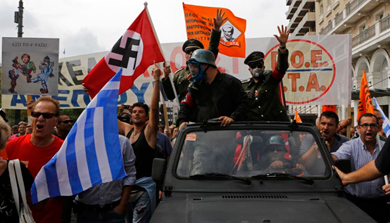 Protesta durante la visita de Merkel a Atenas. | Reuters