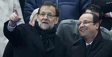 Rajoy y Hollande, durante el partido Francia-Espaa. | B. Tessier / Reuters