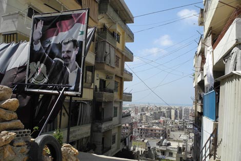Retrato de Bashar al Assad en Jabal al Mohsen. | J. E.