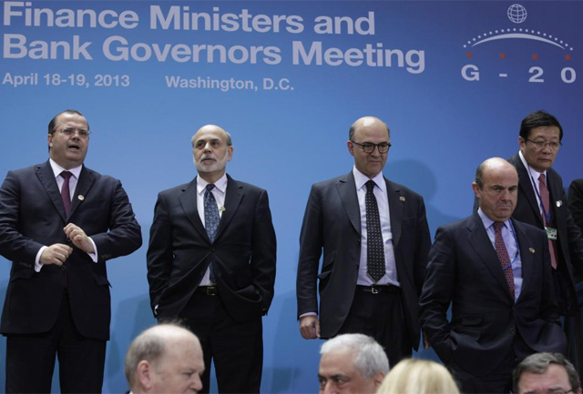 De Guindos, junto con Bernanke, Moscovici y Lou Jiwei. | Reuters