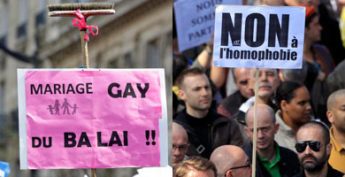 Dos pancartas: 'Matrimonio gay, fuera de aqu!!' y 'No a la homofobia'. | Reuters