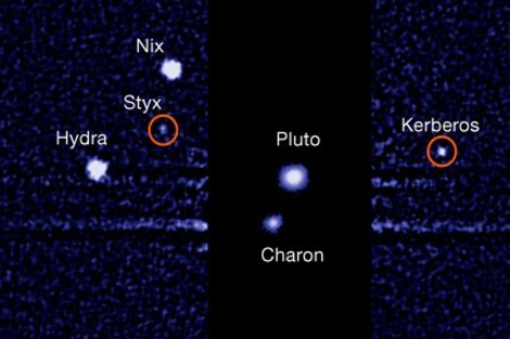Las nuevas lunas de Plutn (sealadas con crculos rojos). | NASA