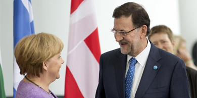 Merkel saluda a Rajoy. | Efe