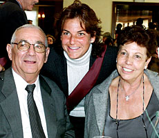 La tenista y sus padre, en 2002. G3