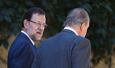 El Rey Juan Carlos, con Rajoy. | Foto: Jaime Reina / AFP