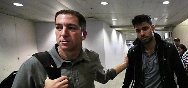David Miranda junto a su pareja, el periodista Glenn Greenwald. | Reuters