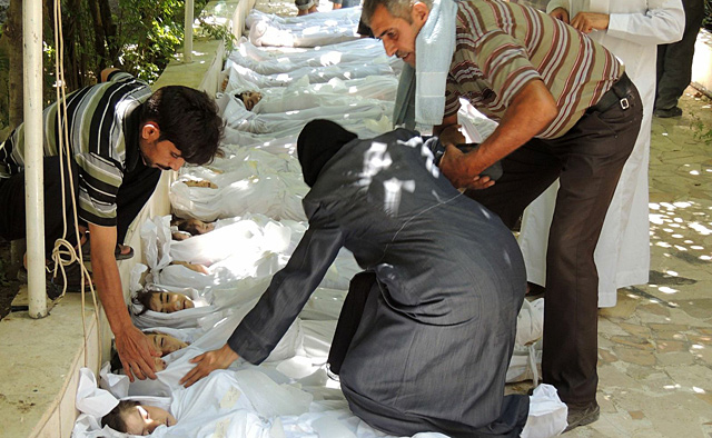 Niños fallecidos en un posible ataque con armas químicas en Damasco.| Afp
