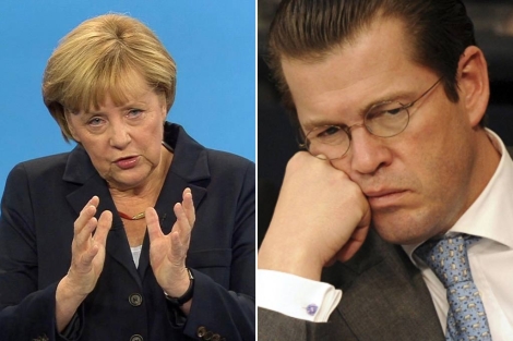Angela Merkel y Zu Guttenberg. | Afp | Efe