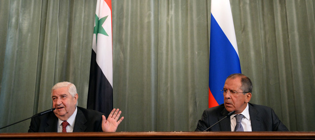 Los ministros de exteriores de Siria y Rusia, Walid Muallem y Sergei Lavrov, tras su reunión | Afp
