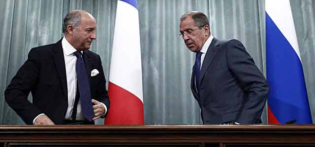 Los ministros de Exteriores ruso y francés durante su encuentro en Moscú. | Reuters