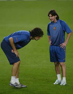 Motta y Messi durante un entrenamiento. (Foto: AFP)