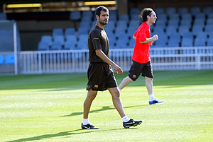Messi, en el entrenamiento, junto a Guardiola. (Foto: EFE)
