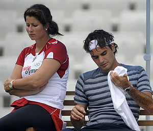 Mirka y Roger, durante un entrenamiento. (Foto: REUTERS)
