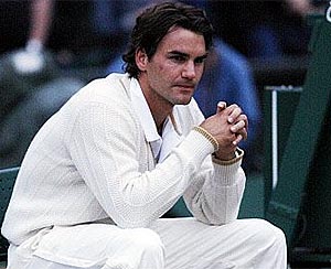 Federer, derrotado en Wimbledon. (AFP)