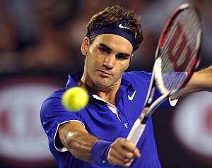 Federer, durante el partido ante Roddick. (Foto: AFP)