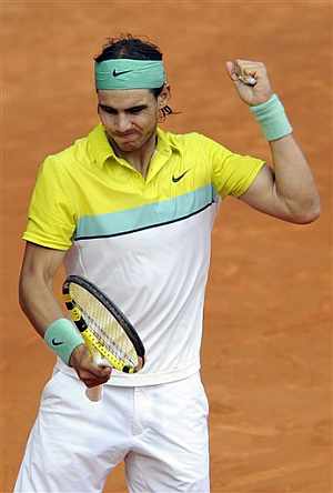 Nadal celebra un punto ganado, en la semifinal ente Djokovic. (AP)
