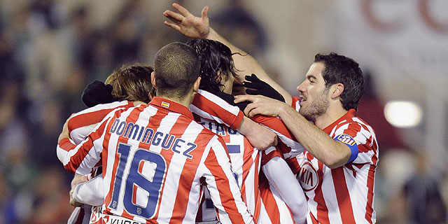 Los jugadores del Atlético celebran uno de los goles. AFP