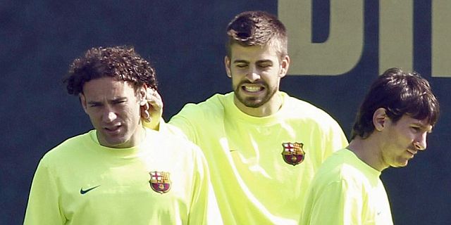 Milito, Piqu y Messi, en un entrenamiento. | Efe