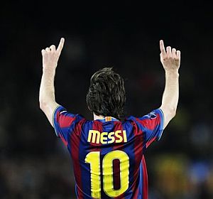 Messi celebra uno de sus cuatro goles al Arsenal. | Ap