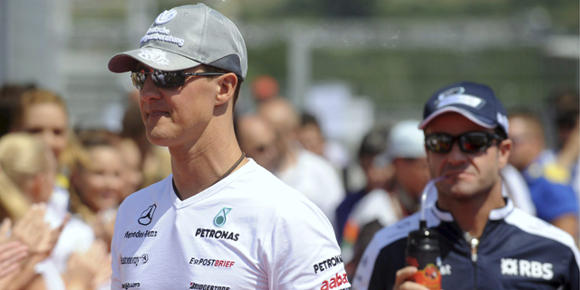 Michael Schumacher (izqu.), y Rubens Barrichello (dcha.), antes del Gran Premio de Hungra. | Efe