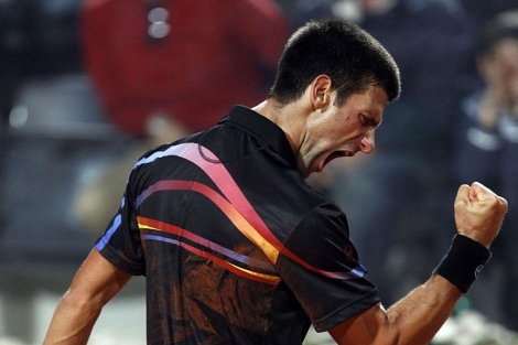 Djokovic celebra un punto ganado ante Murray. (EFE)