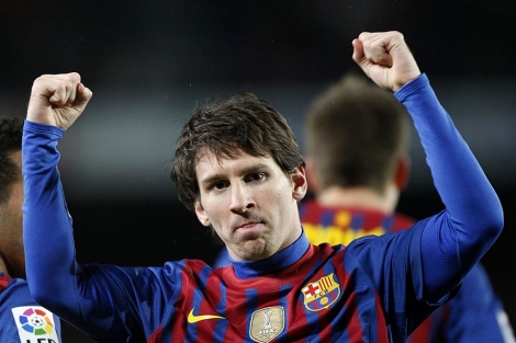 Messi celebra uno de sus goles al Granada. | Reuters