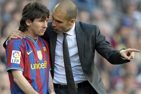Messi y Guardiola, durante un partido. | AFP