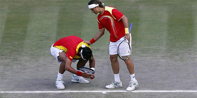 Feliciano Lpez y David Ferrer tras perder el partido por el bronce en dobles. | Efe