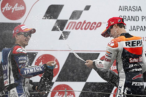 Pedrosa y Lorenzo, en el podio de Motegi. | Reuters