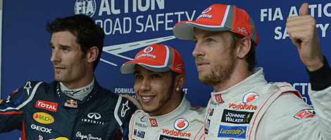 Mark Webber (izda), Lewis Hamilton y Jenson Button (dcha). | AFP