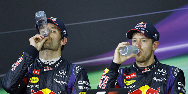 Mark Webber (izda) y Sebastian Vettel, en la rueda de prensa oficial. | EFE
