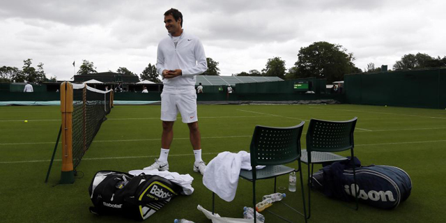 Federer en un entrenamiento previo a Wimbledon. | Reuters