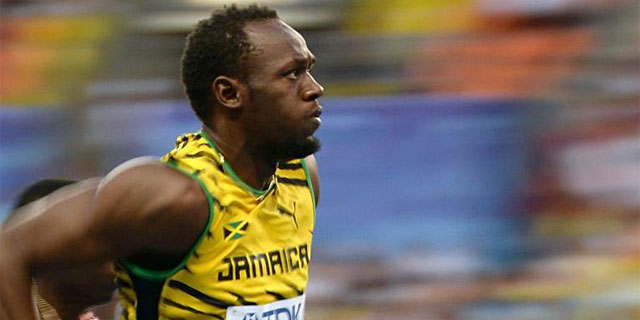 Usain Bolt, durante las eliminatorias. (EFE)