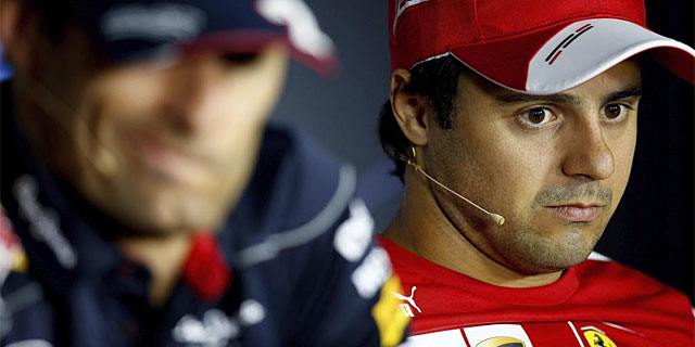 Massa, junto a Webber, el pasado jueves en Monza. (Foto: Efe)